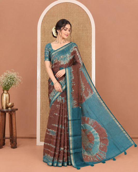 Coffee Brown Muslin Cotton Saree, Adorned with Marble-Textured Shibori Printed All Over Its Body, Subtle Piping Border, Pallu of Shibori Print, and Paired with a Contrast Blouse