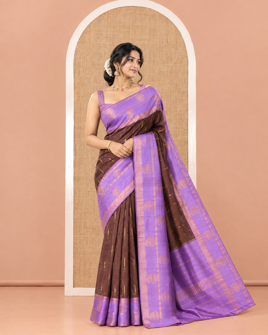 Brown and Lavender Kanchi Silk Saree, Adorned with Zari Buttas All Over Its Body, Complemented by a Contrast Border of Paisleys, Zari-Striped Pallu, and Paired with a Contrast Jacquard Blouse