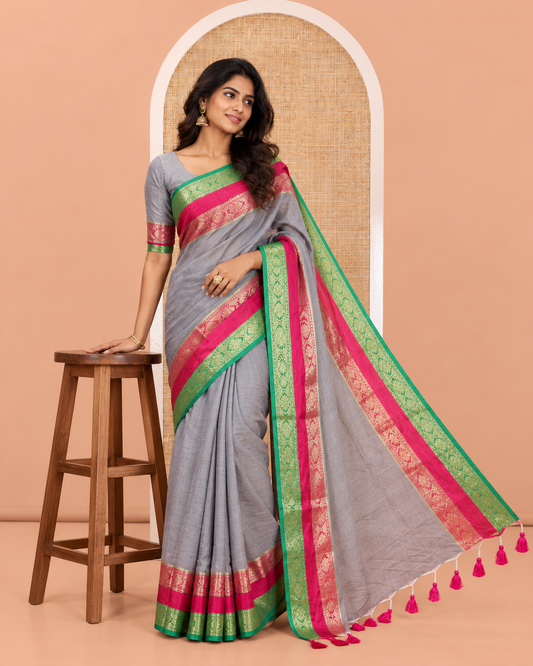 Grey Plain Khadi Mul Cotton Saree, Complemented by a Contrast Rettai Pettu Traditional Diamond-Patterned Border, Plain Pallu, and Paired with a Matching Blouse