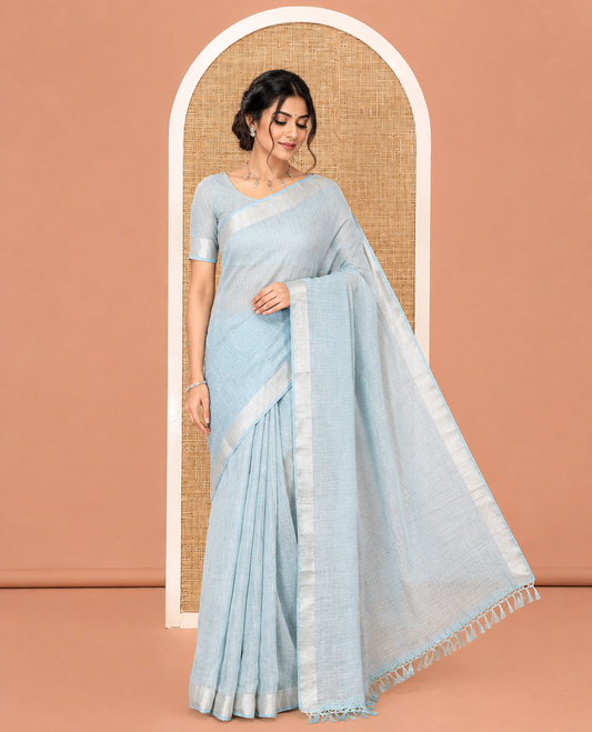 Rama Green Linen Zari Cotton Saree, Gleamed Up with Zari Stripes All Over Its Body, a Subtle Zari Border, a Self-Pallu, and Comes Without a Blouse