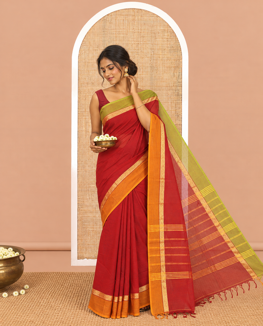 Maroon Plain Chettinad Cotton Saree, a Contrast Ganga-Jamuna Border, Striped Pallu, and a Matching Blouse
