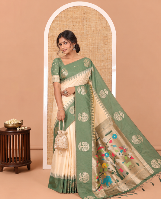 Cream Elite Soft Silk Saree, Woven with Zari Buttas, a Contrast Tree Motifs Temple Border, Paithani-Style Woven Pallu, a Contrast Blouse