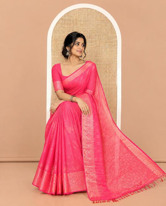 Rani Pink Chiffon Saree, Richly Detailed with Ikat-Style Weave and Stonework, a Traditional Border, a Floral Design Pallu, and a Matching Blouse