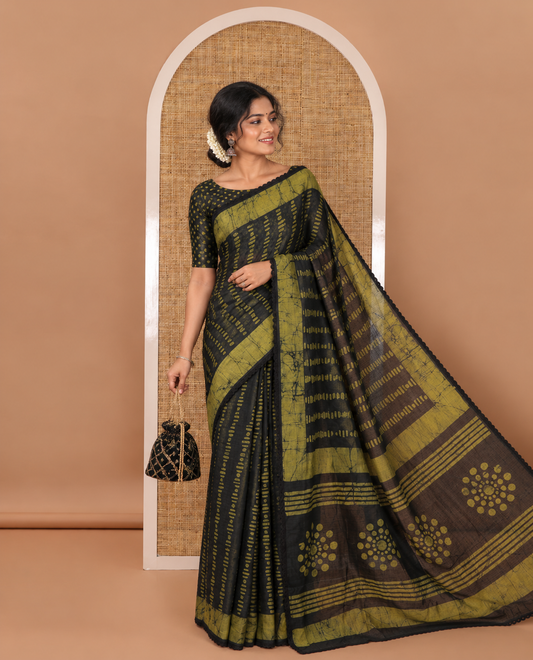 Black handblock wax batik printed kota check saree, contrast batik print lacework border, batik print pallu & polka dots print blouse