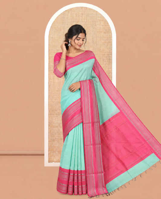 Sea Blue Plain Semi-Raw Silk Saree, a Contrast Silver Zari Border, a Contrast Pallu, and a Contrast Blouse