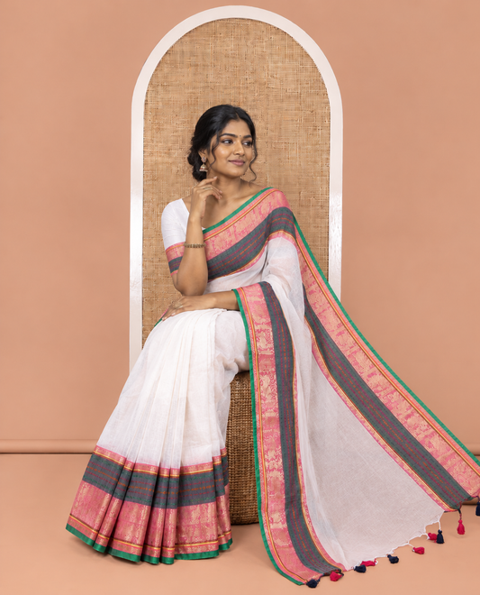 Cream Khadi Mul Cotton Saree, Adorned with Contrast Traditional Yaali-Peacock Border and a Matching Blouse