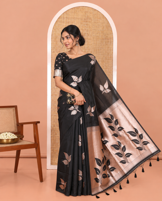 Borderless Black Elite Soft Silk Saree, Adorned with Leaf Motifs, a Self-Pallu of Floral Designs, and a Matching Blouse