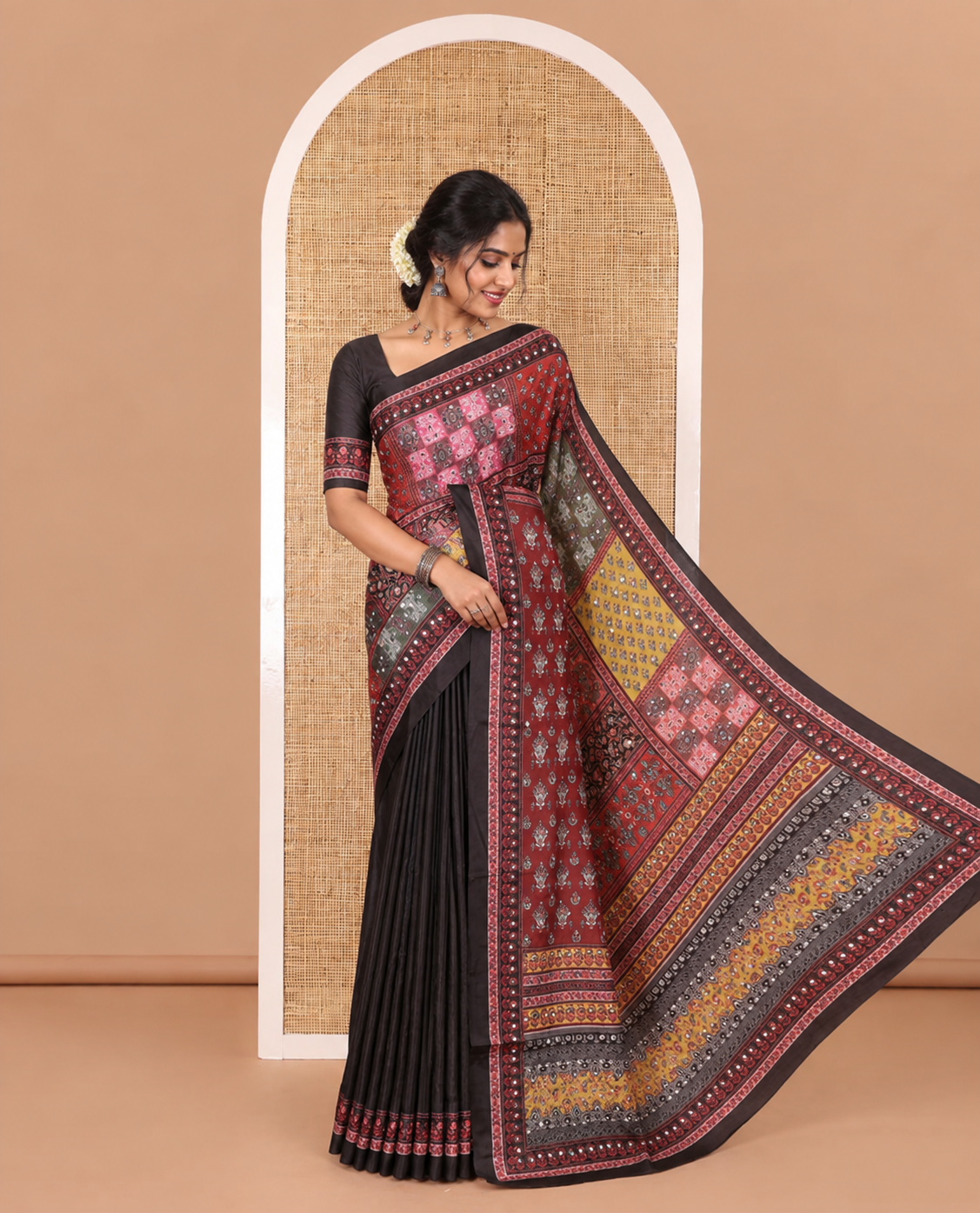 Black geometric printed with mirror work masakali saree, self-border, printed and mirror work pallu, and a matching blouse