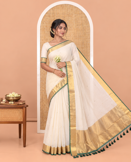 Cream Khadi Mul Cotton Saree, Gleamed Up with Sequined Work, Contrast Gold Zari Border, a Self-Pallu, and a Matching Blouse