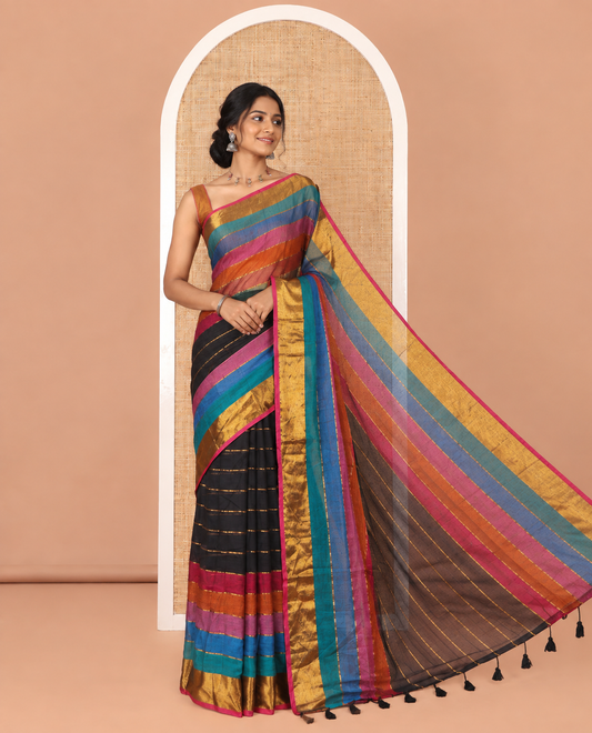 Black Khadi Mul Cotton Saree, Boldly Accentuated with Multi-Color Rainbow Stripes All Over Its Body, Highlighted by Zari Bavanji Border, a Self-Pallu, and Has No Blouse