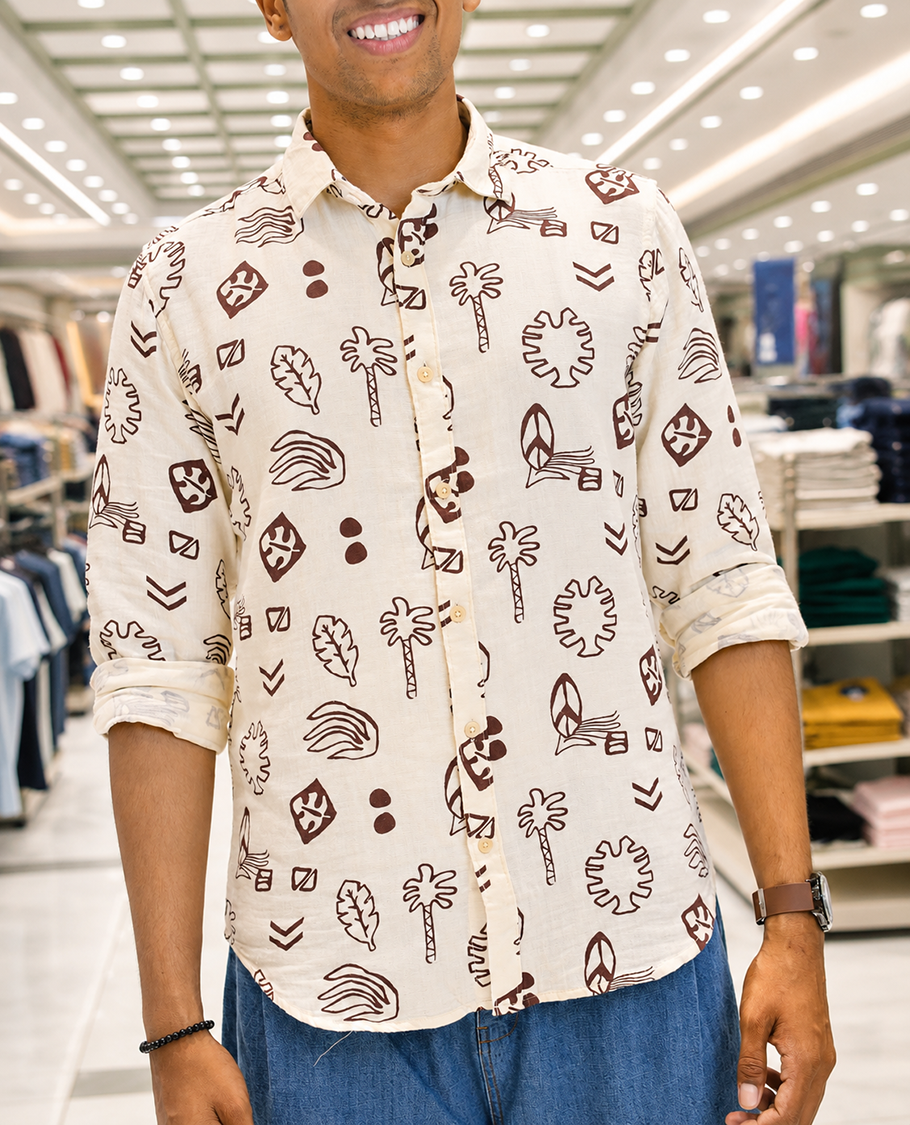 Cream-Brown Cotton-Blended Casual Shirt, Uniquely Printed with Tropical Flora-Theme Motifs, Featuring a Spread Collar, Full Sleeves, Slim Fit, and Regular Length