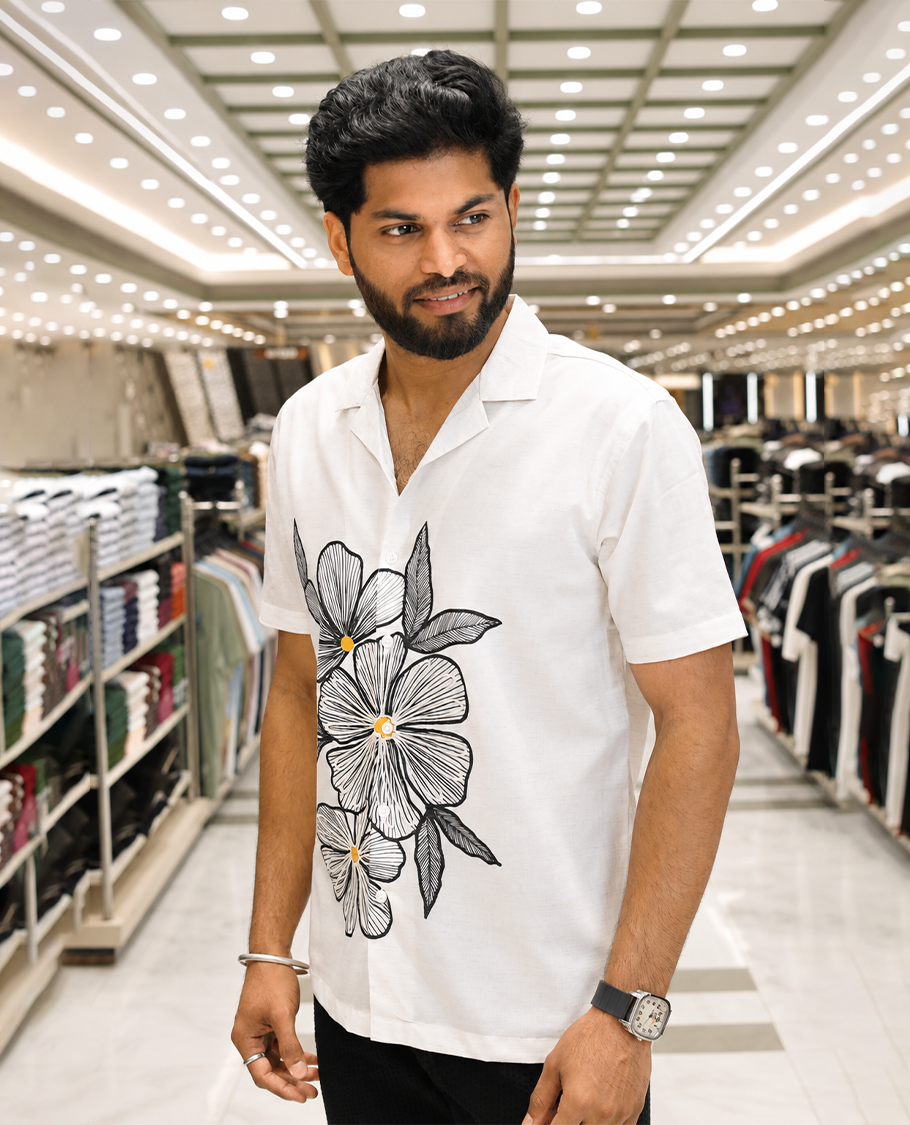 White Cotton-Blended Casual Shirt, Prettified with Floral Motifs Print and Embroidery, Featuring a Cuban Collar, Half Sleeves, Slim Fit, and Regular Length