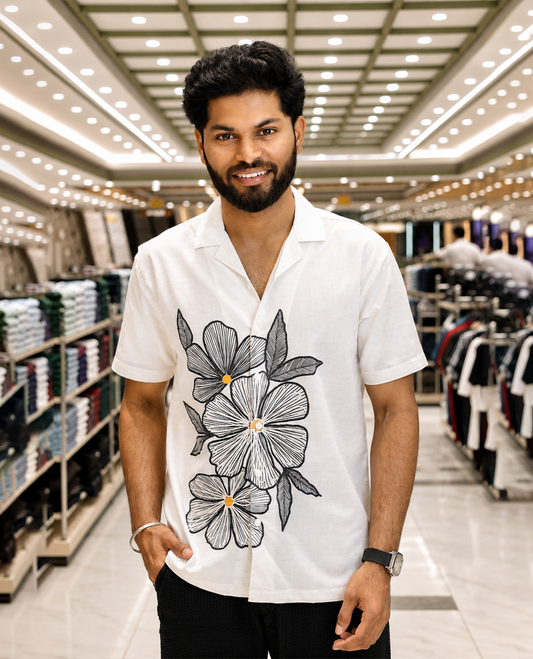 White Cotton-Blended Casual Shirt, Prettified with Floral Motifs Print and Embroidery, Featuring a Cuban Collar, Half Sleeves, Slim Fit, and Regular Length