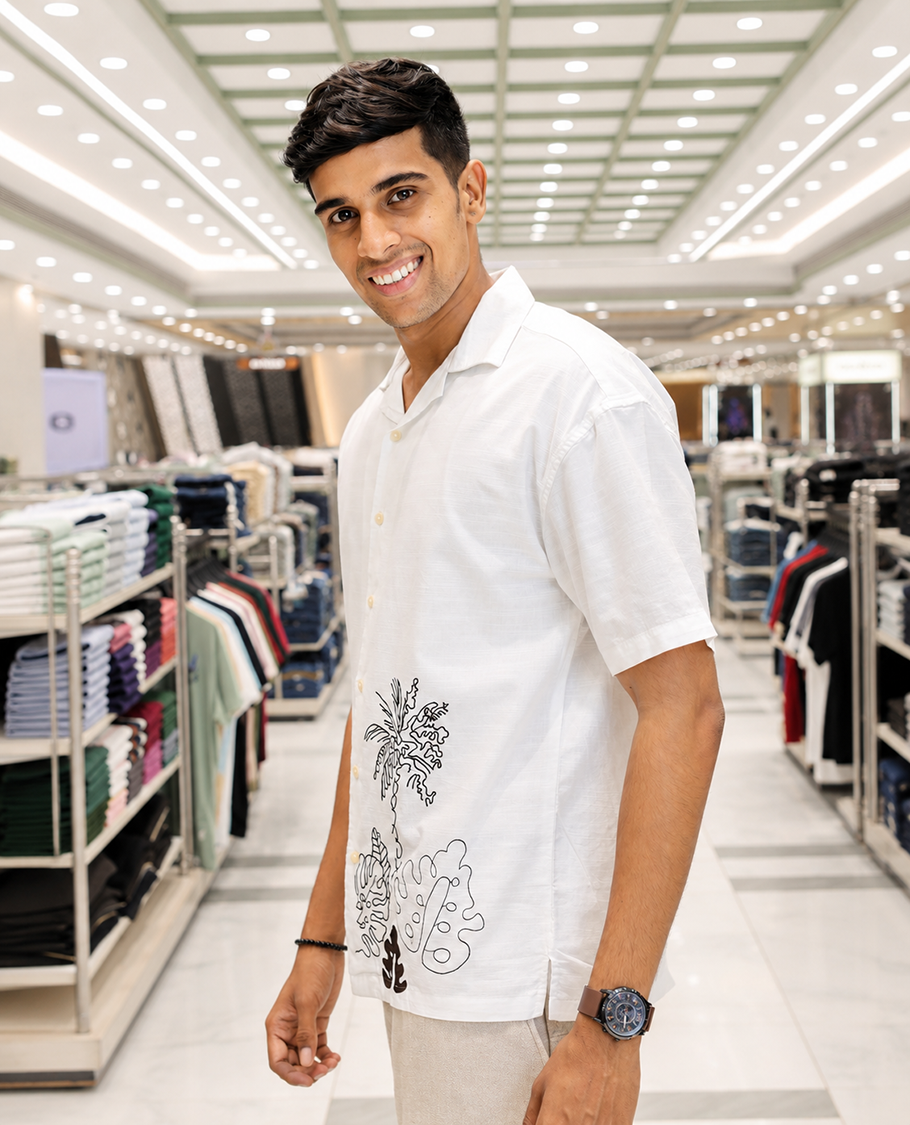 White Cotton Blended Casual Shirt, Delicately Woven with Flora-Theme Embroidery, Featuring a Cuban Collar, Full Sleeves, Regular Fit, and Regular Length