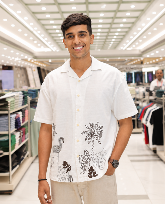 White Cotton Blended Casual Shirt, Delicately Woven with Flora-Theme Embroidery, Featuring a Cuban Collar, Full Sleeves, Regular Fit, and Regular Length