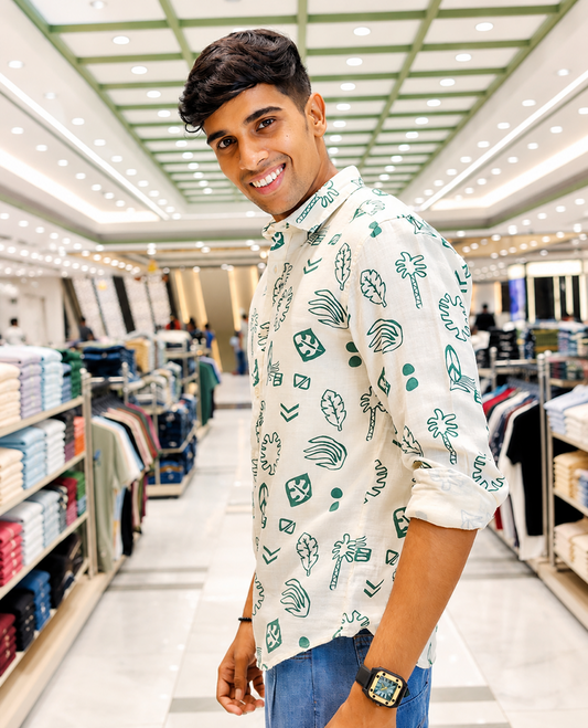Cream-Green Cotton-Blended Casual Shirt, Uniquely Printed with Tropical Flora-Theme Motifs, Featuring a Spread Collar, Full Sleeves, Slim Fit, and Regular Length