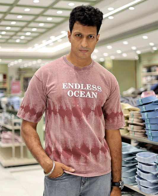 Maroon Cotton-Blended T-Shirt Features Typography Print, Half Sleeves, a Round Neck, an Oversized Fit, and a Regular Length