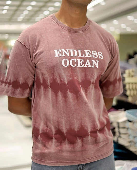 Maroon Cotton-Blended T-Shirt Features Typography Print, Half Sleeves, a Round Neck, an Oversized Fit, and a Regular Length