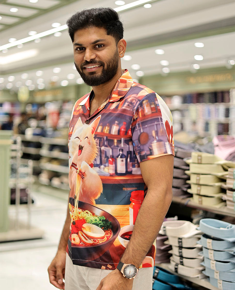 Multi-Color Poly-Blended Casual Shirt Features Funky Cartoon Print, Half Sleeves, a Poly Collar, a Regular Fit, and a Regular Length