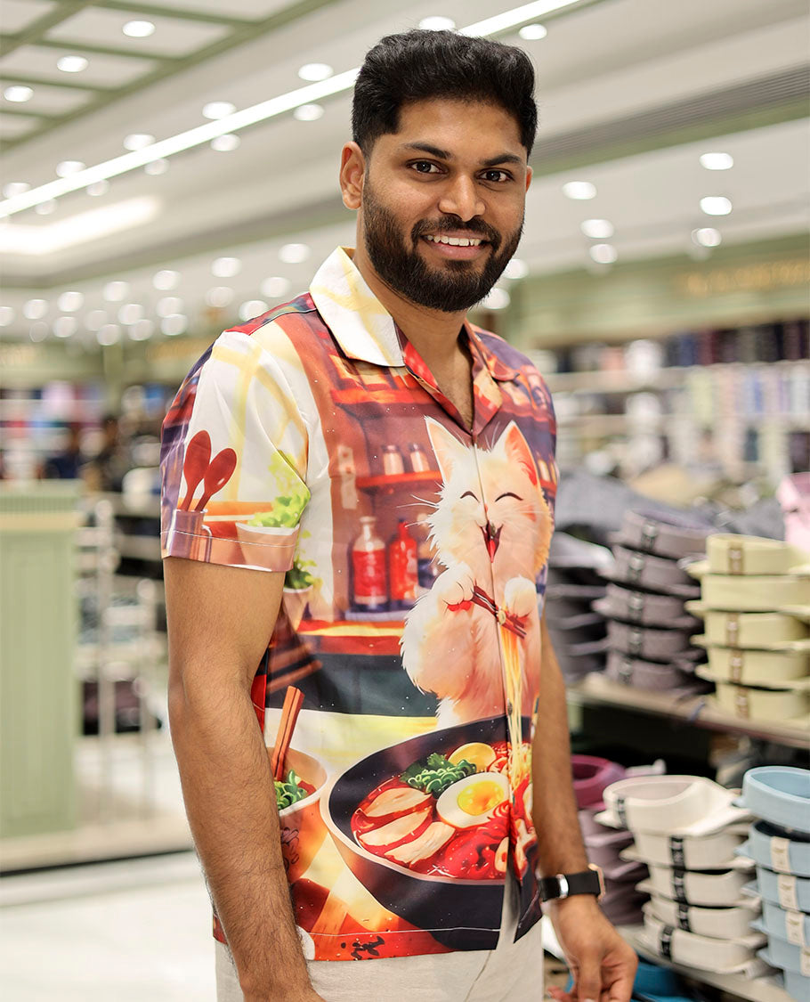 Multi-Color Poly-Blended Casual Shirt Features Funky Cartoon Print, Half Sleeves, a Poly Collar, a Regular Fit, and a Regular Length
