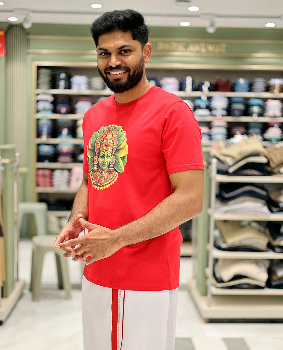 Red Cotton-Blended T-Shirt Features Onam-Themed Kathakali Face Print, Half-Sleeves, a Round Neck, a Slim Fit, and a Regular Length