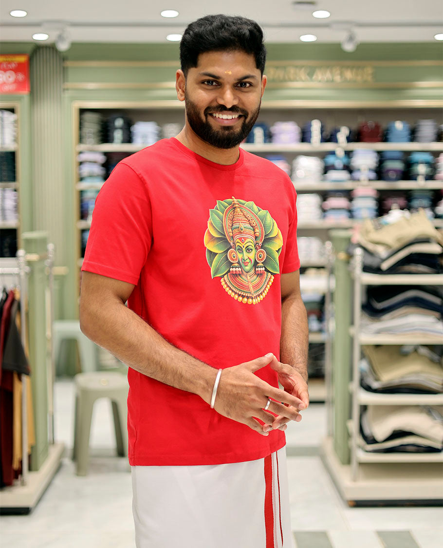 Red Cotton-Blended T-Shirt Features Onam-Themed Kathakali Face Print, Half-Sleeves, a Round Neck, a Slim Fit, and a Regular Length