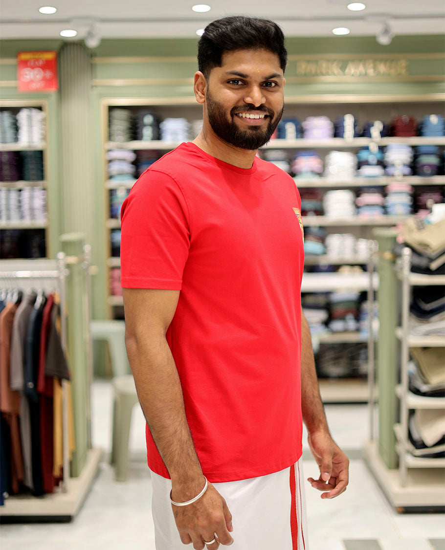 Red Cotton-Blended T-Shirt Features Onam-Themed Kathakali Face Print, Half-Sleeves, a Round Neck, a Slim Fit, and a Regular Length