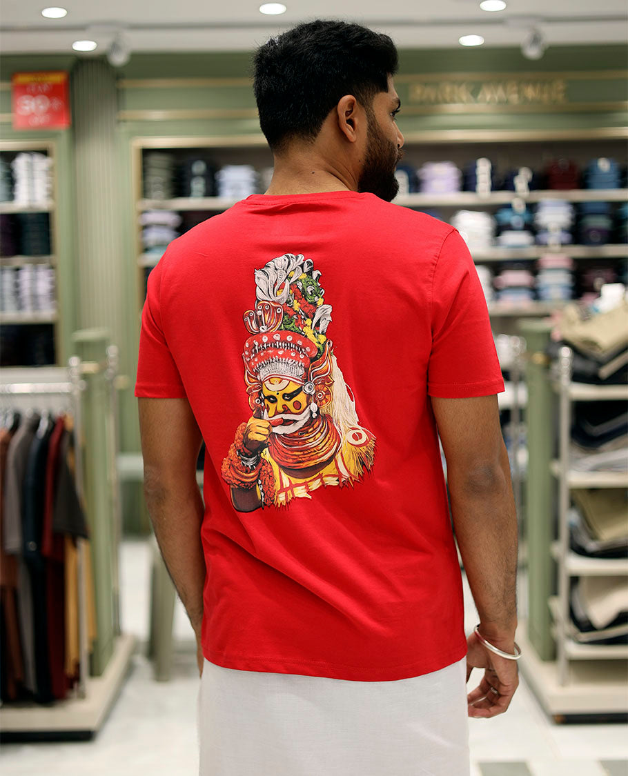 Red Cotton-Blended T-Shirt Features Onam-Themed Kathakali Face Print, Half-Sleeves, a Round Neck, a Slim Fit, and a Regular Length