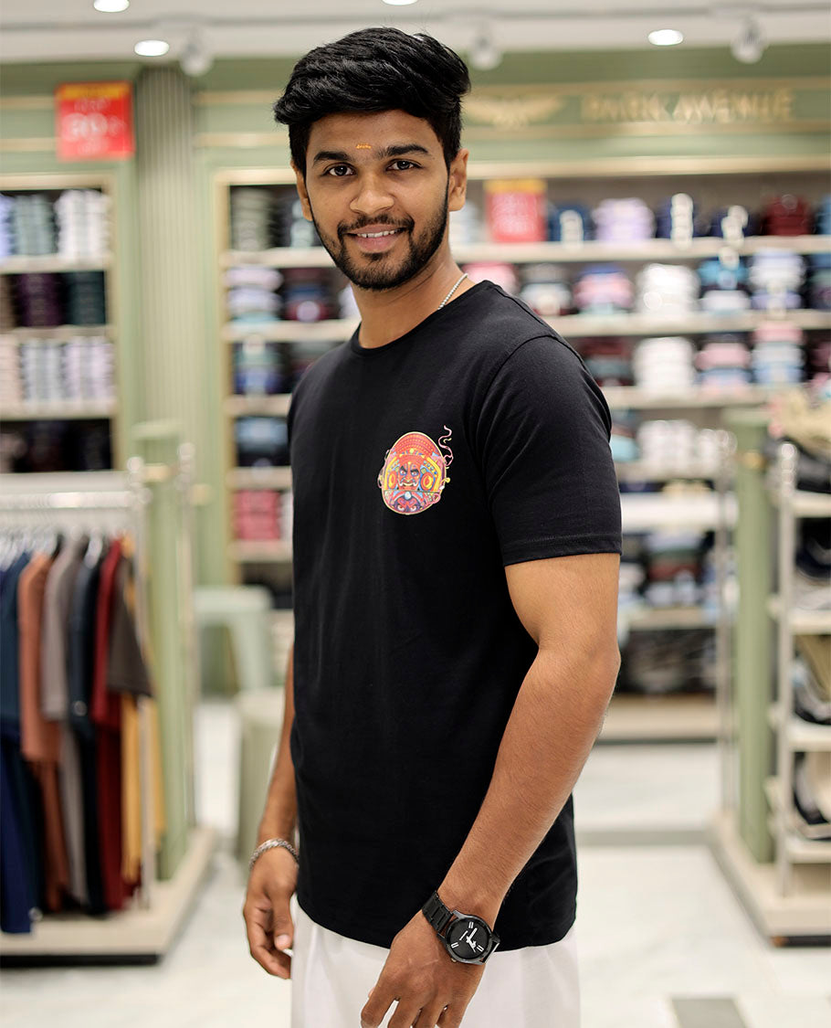 Black Cotton-Blended T-Shirt Features Multi-Colored Kathakali Print, Half-Sleeves, a Round Neck, a Slim Fit, and a Regular Length