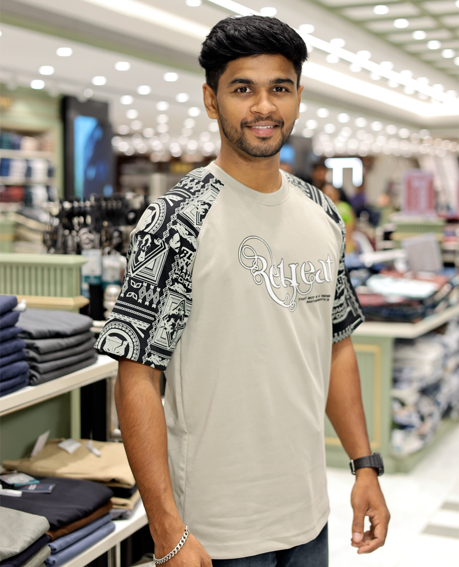  Cream Cotton-Blended Crew-Neck T-Shirt Features Typography Print, Printed Half-Sleeves, Regular Fit, and Regular Length