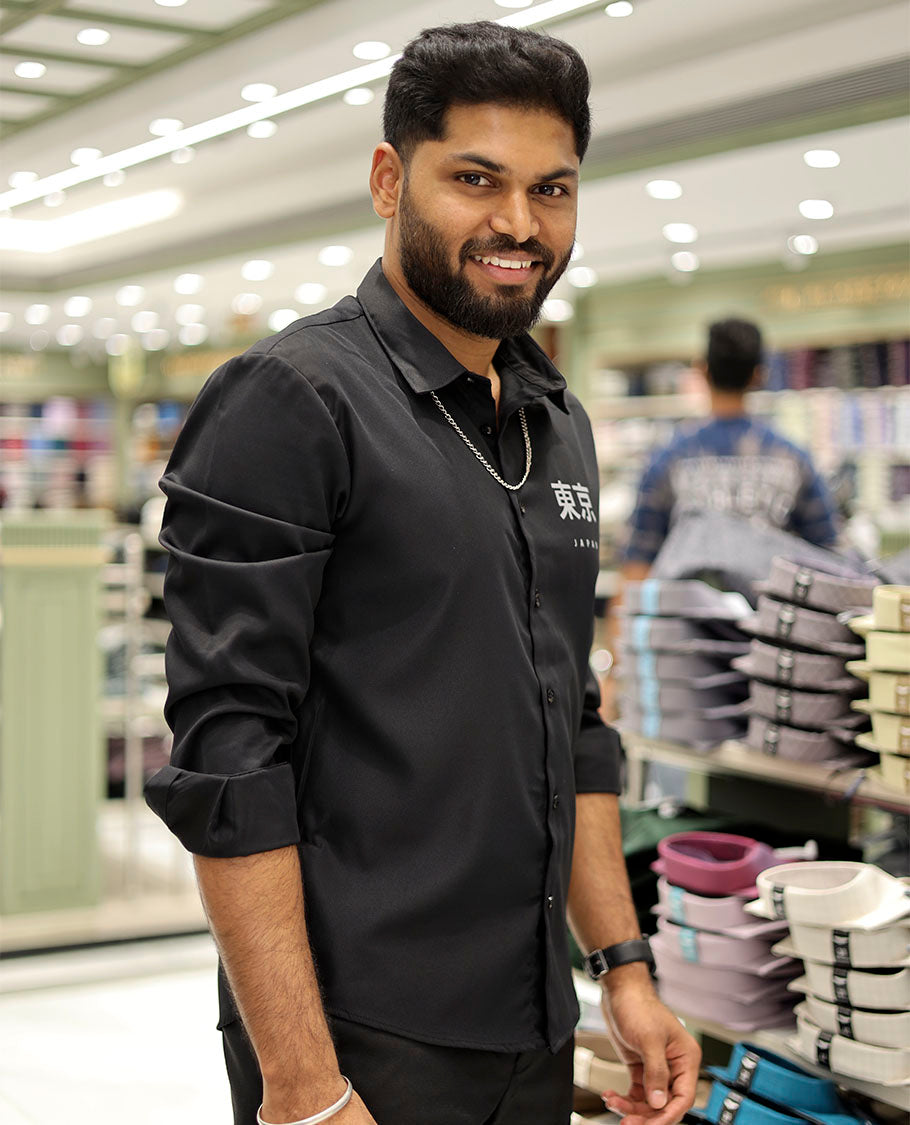 Black Cotton-Blended Casual Shirt Features Typographic Print, Full-Sleeves, a Spread Collar, a Regular Fit, and a Regular Length