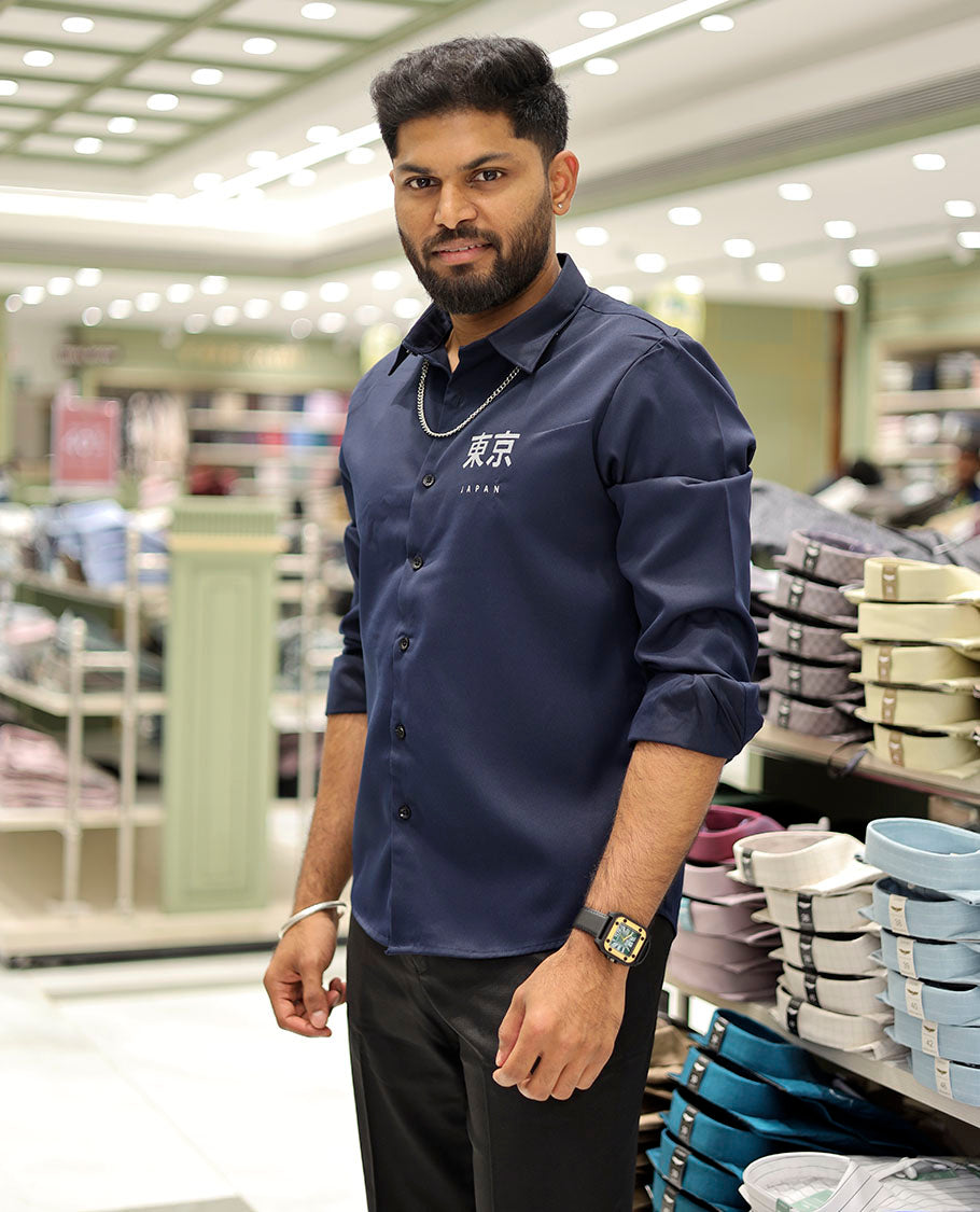 Navy Cotton-Blended Casual Shirt Features Typographic Print, Full-Sleeves, a Spread Collar, a Regular Fit, and a Regular Length