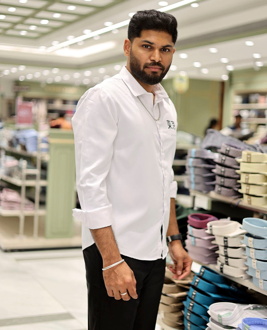 White Cotton-Blended Casual Shirt Features Typographic Print, Full-Sleeves, a Spread Collar, a Regular Fit, and a Regular Length