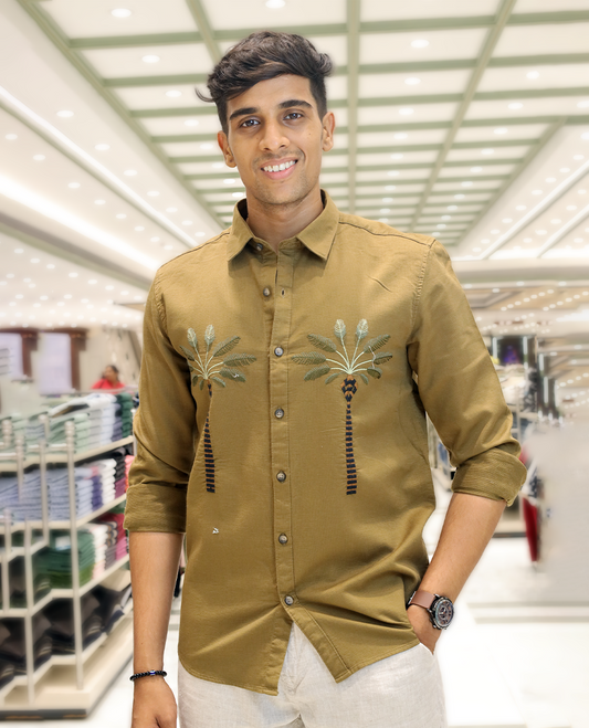 Coffee Brown Cotton-Blended Casual Shirt, Artfully Designed with Palm Tree Motifs Embroidery, Featuring a Spread Collar, Full Sleeves, Slim Fit, and Regular Length
