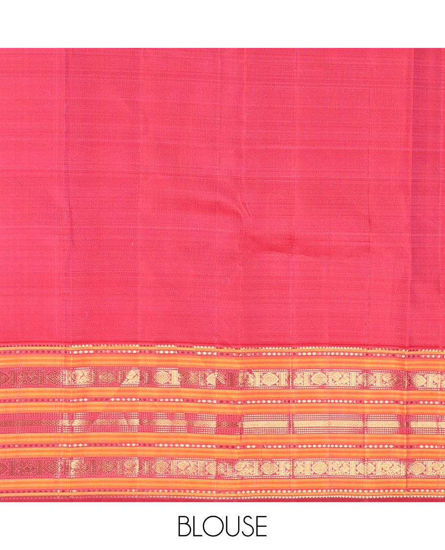 Green checked pure silk saree, contrast border of rekku, plus buttas, muthu, mayil kann, and mayil chakram designs, and zari-rich jaal pallu