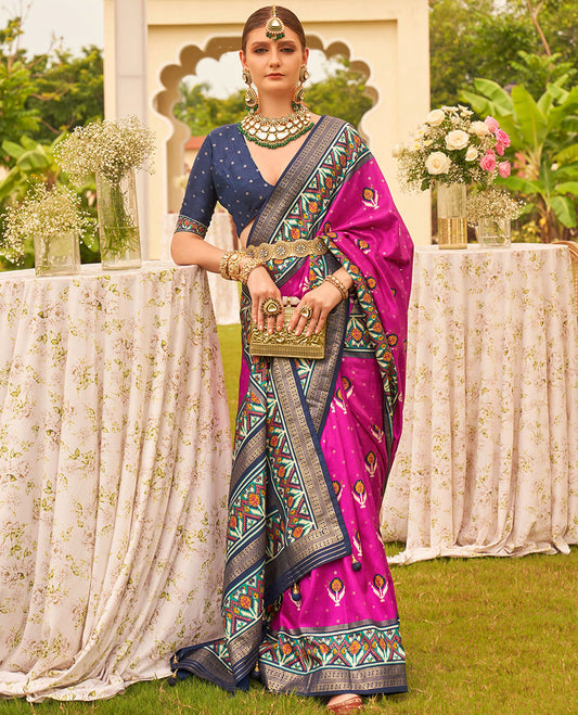 Rani pink patola floral motifs printed designer saree, contrast intricate patola border, and floral motifs patola printed pallu