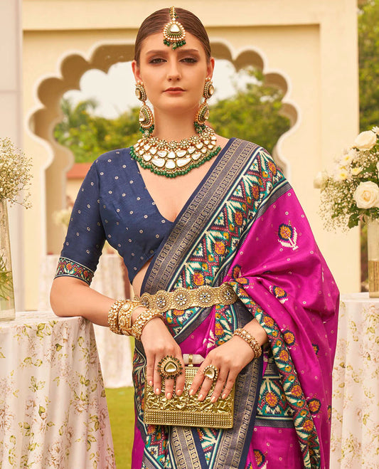 Rani pink patola floral motifs printed designer saree, contrast intricate patola border, and floral motifs patola printed pallu