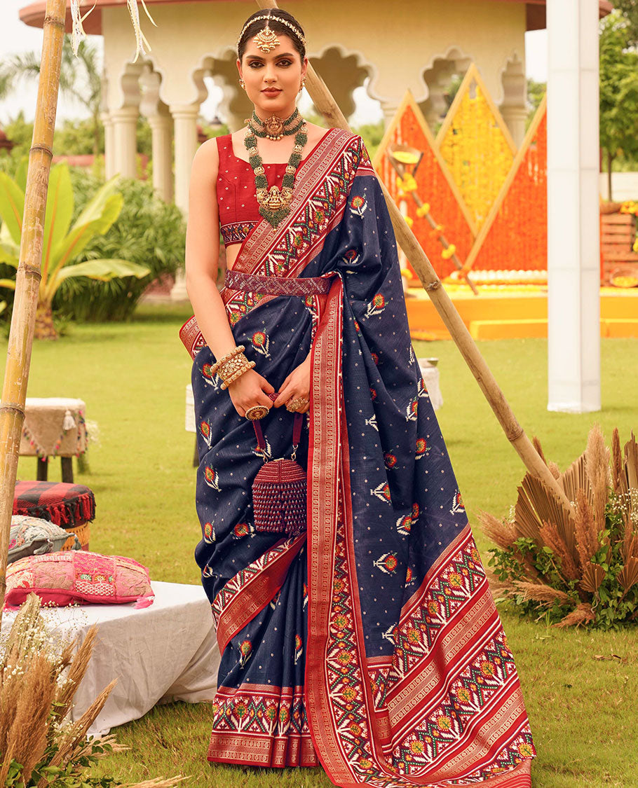 Navy blue patola floral motifs printed designer saree, contrast intricate patola border, and floral motifs patola printed pallu