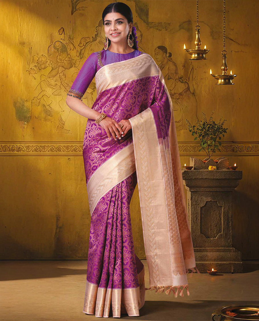 Magenta Kanchipuram Wedding Silk Saree Elegantly Decked Up with Jacquard Design Weave, Complemented by Contrast Traditional Zari Border Depicting Leaf Vine Designs, Pallu Richly Woven in Jaal, and Paired with a Contrast Blouse