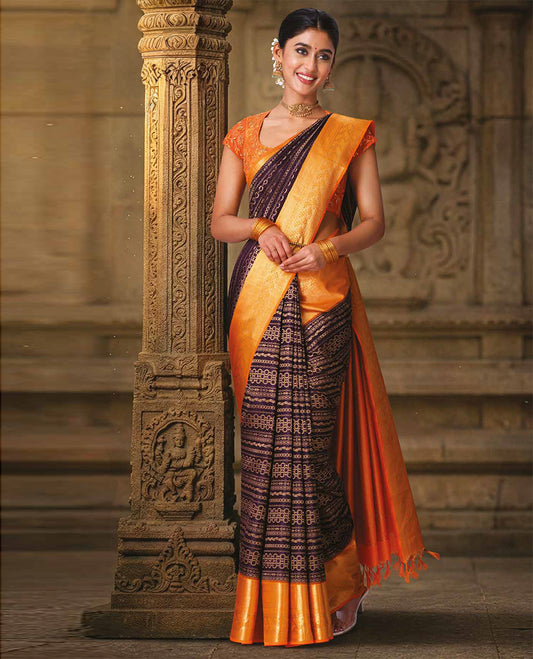 Purple geometric patterns jacquard silk saree, contrast traditional zari border of leaf vine, and intricate pallu