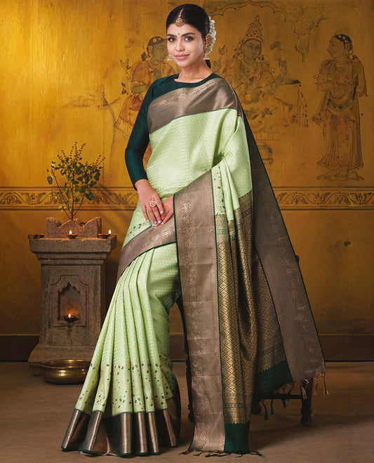 Pista green jacquard kanchipuram wedding silk saree, contrast traditional zari design border, and zari-rich jaal pallu