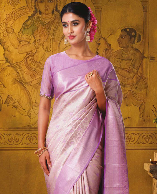Baby pink jacquard Kanchipuram wedding silk saree, contrast traditional zari border, and jaal pallu