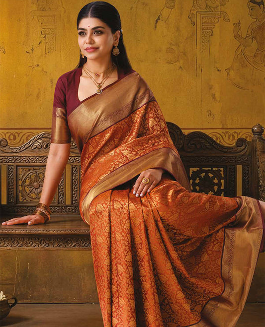 Rust floral jacquard kanchipuram wedding silk saree, contrast traditional zari design border, and intricate pallu